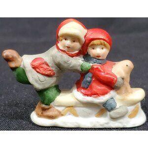 Boy & Girl SLEDDING with DOG Christmas Village accessory figure porcelain 1.5"H